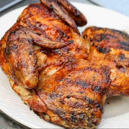Half a chicken on charcoal