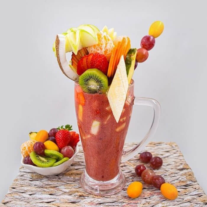 Cocktail with fruit pieces