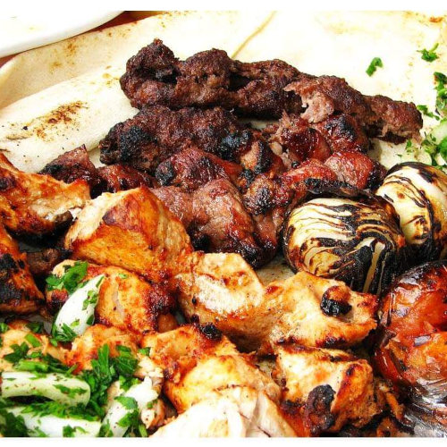 Mixed grill meal (kebab + shkaf + chicken) + salads + cola + pickles 35 shekels